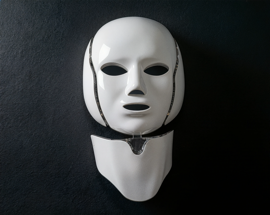 NeoTelle 7-color LED face and neck therapy mask on dark background